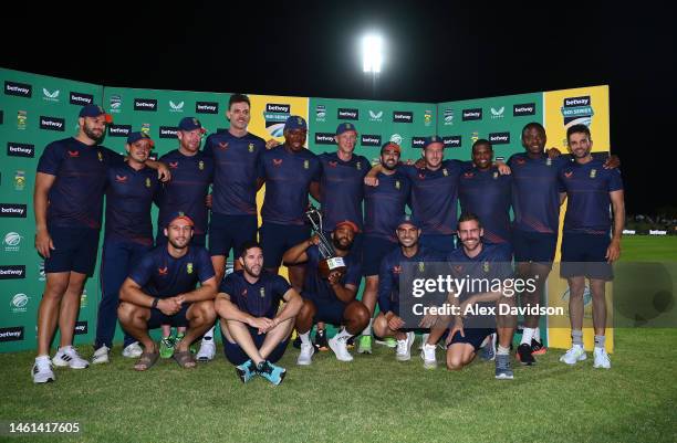 South Africa captain Temba Bavuma holds the trophy as his side celebrate a 2-1 series victory after the 3rd ODI match between South Africa and...