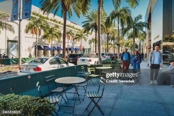 rodeo drive stores people beverly hills los angeles california - rodeo drive stock pictures, royalty-free photos & images