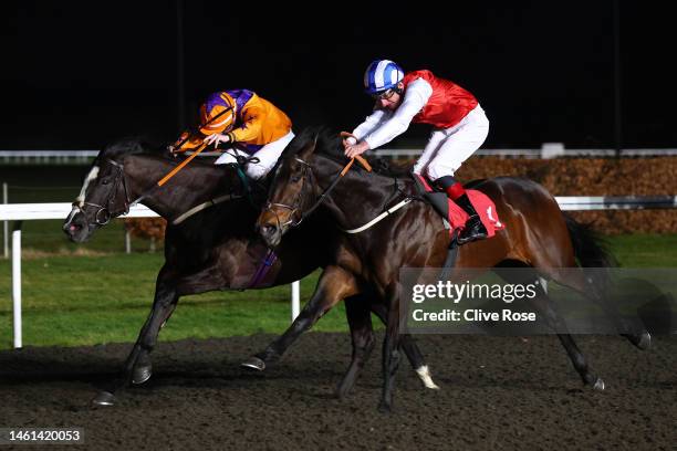 Adam Kirby riding Positive overtakes Kieran O'Neill on Naval Commander to win the The Unibet 3 Uniboosts A Day Handicap Stakes at Kempton Park on...