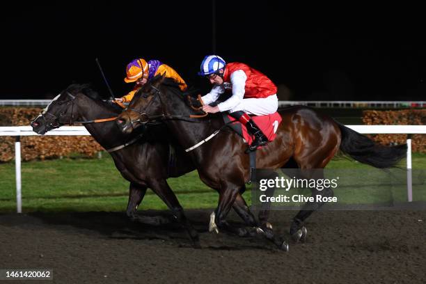 Adam Kirby riding Positive overtakes Kieran O'Neill on Naval Commander to win the The Unibet 3 Uniboosts A Day Handicap Stakes at Kempton Park on...