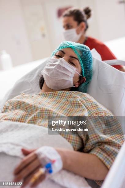 going  to operating room - caesarean section stock pictures, royalty-free photos & images