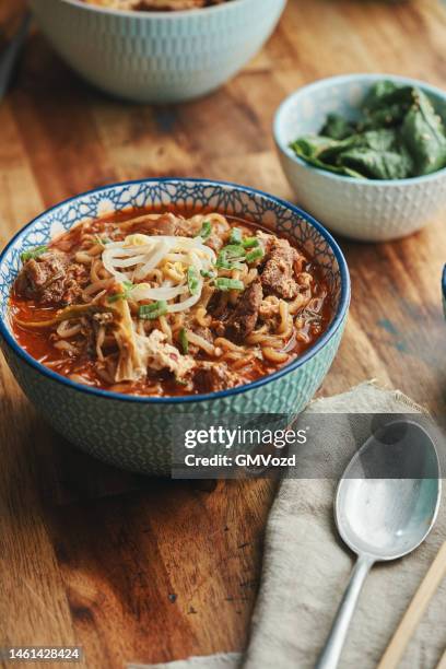 korean spicy yuk kal beef ramen noodles - miso sauce stock pictures, royalty-free photos & images