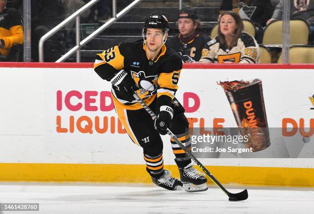 Teddy Blueger of the Pittsburgh Penguins skates against the San Jose Sharks at PPG PAINTS Arena on January 28, 2023 in Pittsburgh, Pennsylvania.