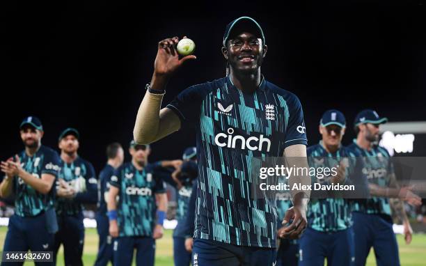 Jofra Archer of England leads the team off after taking 6 wickets during the 3rd One Day International between South Africa and England at the...