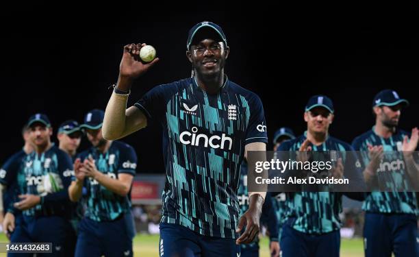 Jofra Archer of England leads the team off after taking 6 wickets during the 3rd One Day International between South Africa and England at the...