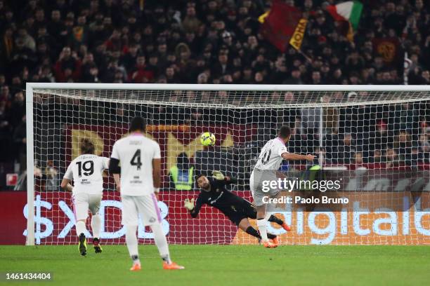 Cyriel Dessers of US Cremonese scores the team's first goal from the penalty spot during the Coppa Italia Quarter Final match between AS Roma and US...