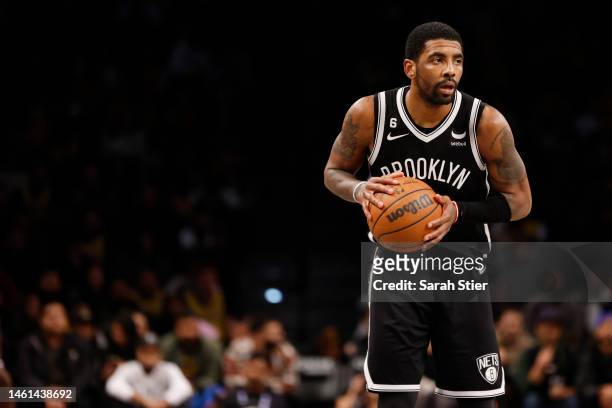 Kyrie Irving of the Brooklyn Nets dribbles during the second half against the Los Angeles Lakers at Barclays Center on January 30, 2023 in the...