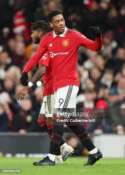 Anthony Martial of Manchester United celebrates after scoring the team's first goal during the Carabao Cup Semi Final 2nd Leg match between...