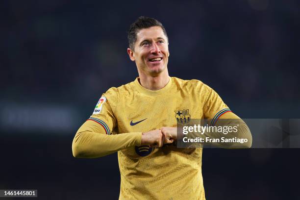 Robert Lewandowski of FC Barcelona celebrates after scoring the team's second goal during the LaLiga Santander match between Real Betis and FC...