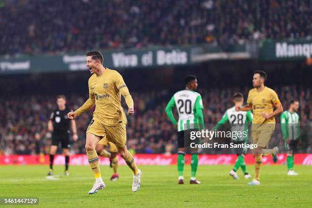 Robert Lewandowski of FC Barcelona celebrates after scoring the team's second goal during the LaLiga Santander match between Real Betis and FC...