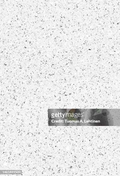 close-up of a white wall or flooring made of concrete or cement and small stones. - terrazzo ストックフォトと画像