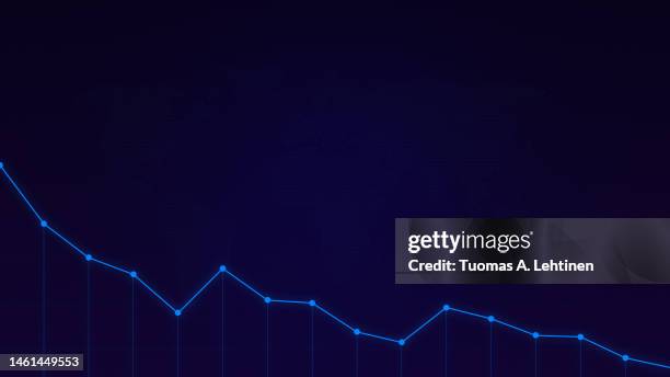 simple descending light blue line graph on a dark blue background with pixelated world map. - reducción fotografías e imágenes de stock
