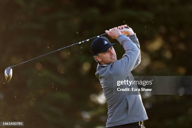 Retired baseball player Buster Posey tees off on the third hole prior to the AT&T Pebble Beach Pro-Am at Pebble Beach Golf Links on February 01, 2023...
