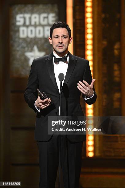 Actor Steve Kazee accepts the award for Best Performance by a Leading Actor in a Musical for 'Once' onstage at the 66th Annual Tony Awards at The...