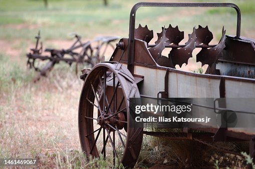 Rusty File Farm Old Rusty Farm Equipment On Field Defocused Background Photo - Getty Images