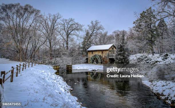 a saw mill alongside a pond during wintertime - rural illinois stock pictures, royalty-free photos & images