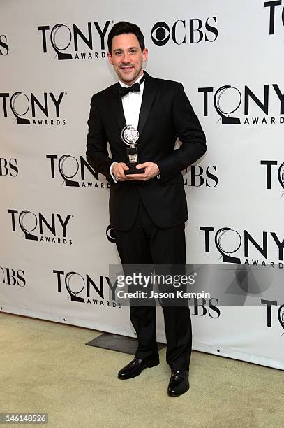 Actor Steve Kazee, winner of Best Performance by a Leading Actor in a Musical for 'Once' poses in the 66th Annual Tony Awards press room at The...
