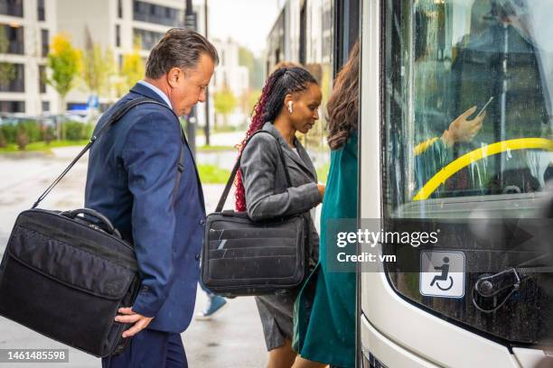 business people boarding and commuter bus - shuttle bus stock pictures, royalty-free photos & images