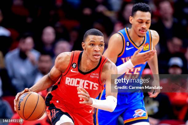 Jabari Smith Jr. #1 of the Houston Rockets controls the ball ahead of Darius Bazley of the Oklahoma City Thunder during the first half at Toyota...