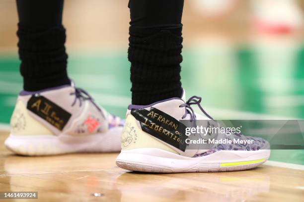 The shoes of Kyrie Irving of the Brooklyn Nets during the first half of the game against the Boston Celtics at TD Garden on February 01, 2023 in...