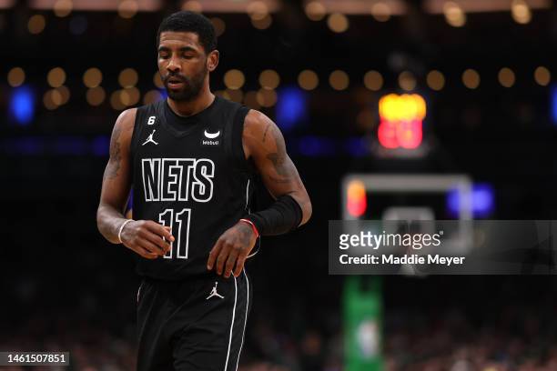 Kyrie Irving of the Brooklyn Nets looks on during the first half against the Boston Celtics at TD Garden on February 01, 2023 in Boston,...