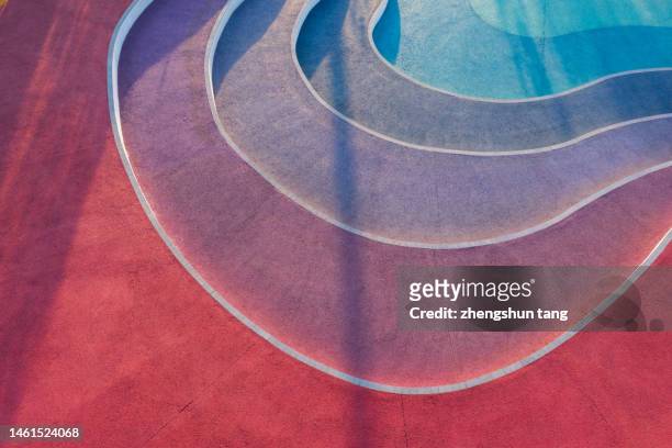 colorful stairs pavement - conceptual bold red stock-fotos und bilder