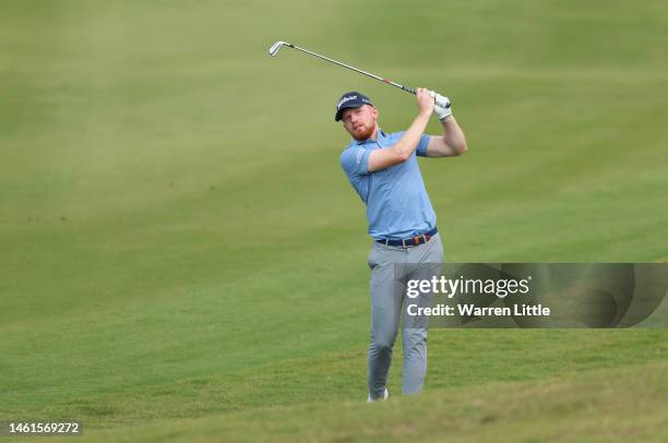 John Murphy of Ireland plays his approach shot on the hole during Day One of the Ras Al Khaimah Championship at Al Hamra Golf Club on February 02,...