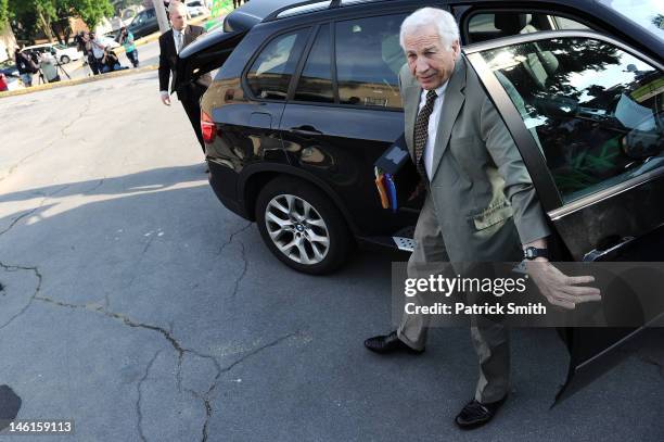 Former Penn State assistant football coach Jerry Sandusky walks into the Centre County Courthouse before the first day of his child sex abuse trial...