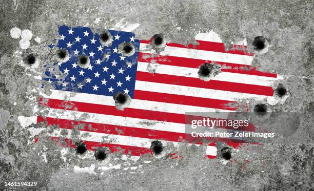 wall with us flag mural and bullet holes - bullet holes stock-fotos und bilder