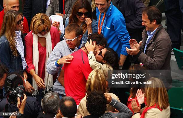 Rafael Nadal of Spain celebrates victory with girlfriend Xisca Perello after the men's singles final against Novak Djokovic of Serbia during day 16...