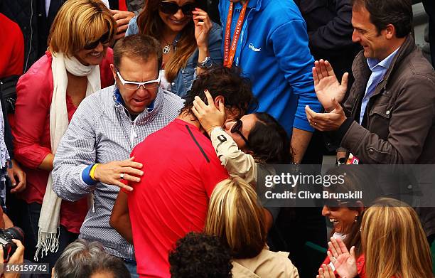 Rafael Nadal of Spain celebrates victory with girlfriend Xisca Perello after the men's singles final against Novak Djokovic of Serbia during day 16...