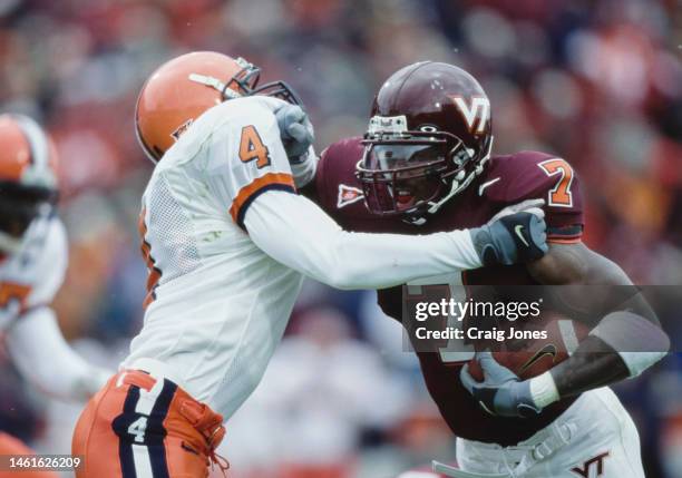 Kevin Jones, Running Back for the Virginia Tech Hokies in motion running the football during the NCAA Big East Conference college football game...