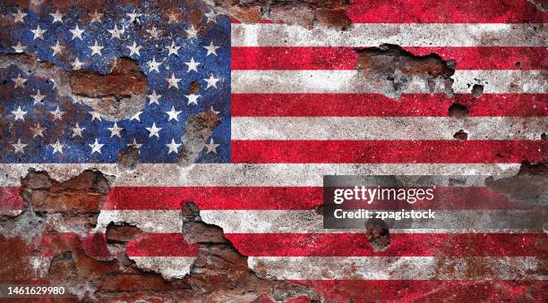 us flag on damaged wall - disintegration stock pictures, royalty-free photos & images