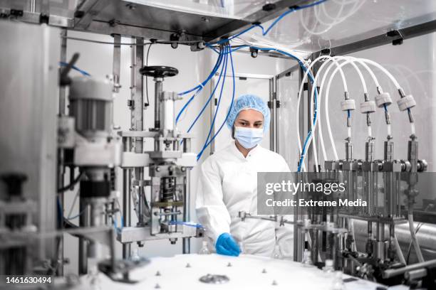pharmaceutical advancements: bottle manufacturing with multiple functions - pharmaceutical compounding stock pictures, royalty-free photos & images