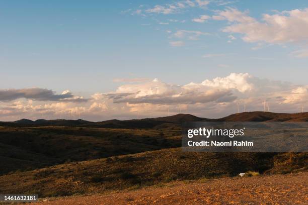 wind turbines on an arid landscape in silverton, australia - outback windmill bildbanksfoton och bilder