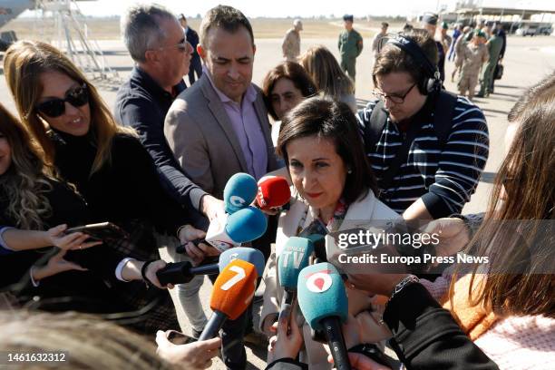 The Minister of Defense, Margarita Robles, gives statements to the media during her visit to the 'Mendez Parada' Military Parachuting School, at the...