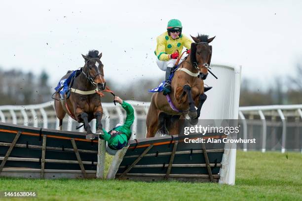 Freddie Gordon riding Sami Bear is unseated and dragged through the hurdle at the last when leading during The JenningsBet Witney Handicap Hurdle at...