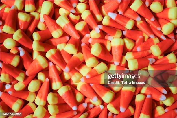 heap of red and yellow vintage candy - bonbon halloween stock pictures, royalty-free photos & images