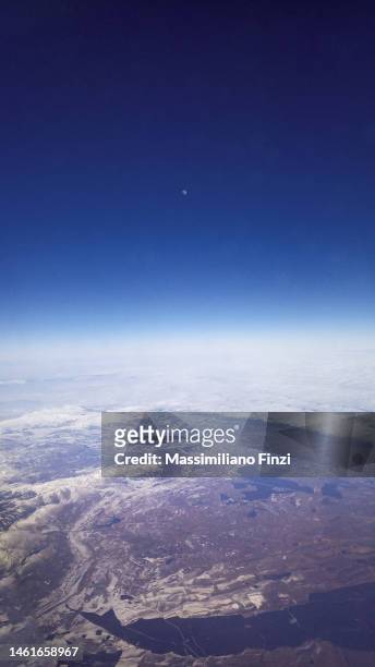 high angle view of the earth with the dark sky, the clouds - snow world stock pictures, royalty-free photos & images