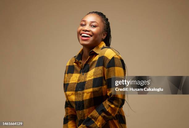 portrait of happy black young woman in lumberjack shirt. - skogshuggarskjorta bildbanksfoton och bilder
