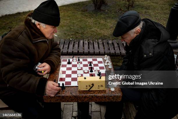 Elderly men play chess in the chess area in the Taras Shevchenko Park on January 22, 2023 in Kyiv, Ukraine. Russian invasion approaches its one-year...