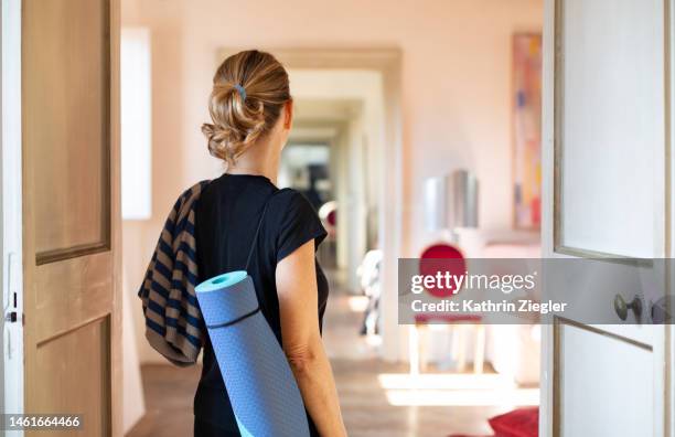 off to yoga class! - left stock pictures, royalty-free photos & images