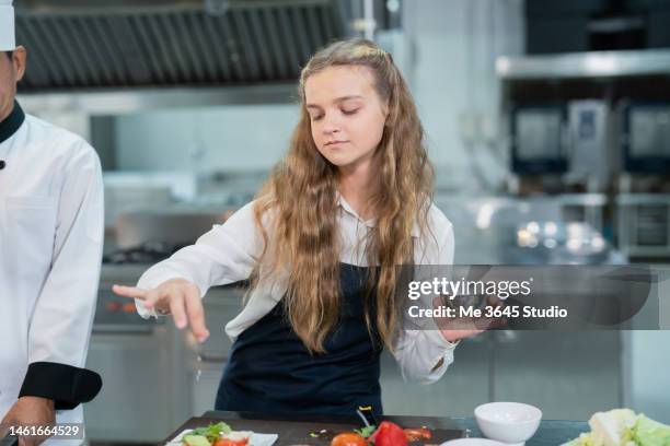 students learn to cook from expert chefs. - apprentice chef stock pictures, royalty-free photos & images