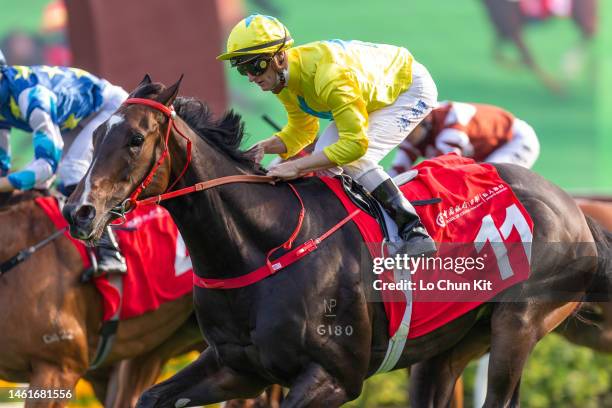 Jockey Zac Purton riding Lucky Sweynesse wins the Race 6 BOCHK Private Banking Jockey Club Sprint at Sha Tin Racecourse on November 20, 2022 in Hong...