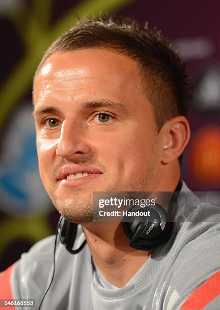 In this handout image provided by UEFA, Dariusz Dudka of Poland talks to the media during a UEFA EURO 2012 press conference at the National Stadium...