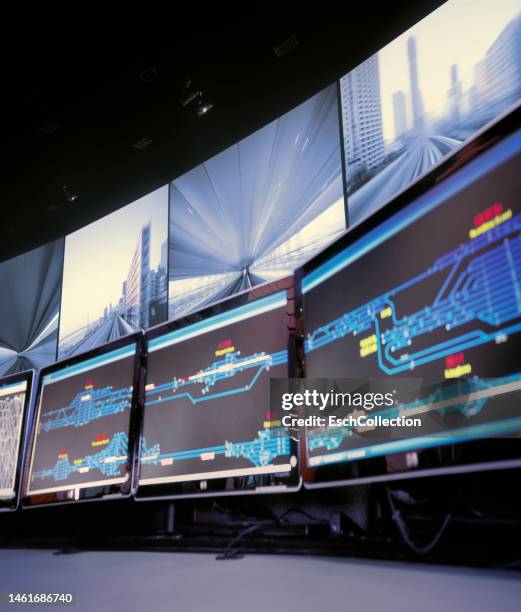 railway control room with live camera feed from trains - bewakingsapparatuur stockfoto's en -beelden