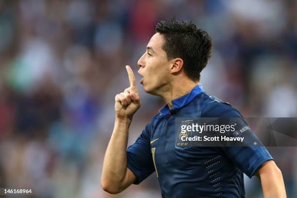 Samir Nasri of France celebrates scoring their first goal during the UEFA EURO 2012 group D match between France and England at Donbass Arena on June...