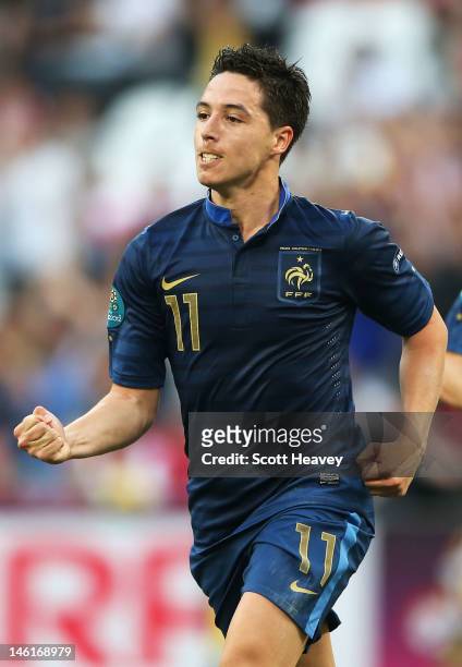 Samir Nasri of France celebrates scoring their first goal during the UEFA EURO 2012 group D match between France and England at Donbass Arena on June...