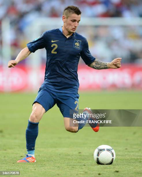 French midfielder Mathieu Debuchy drives the ball during the Euro 2012 championships football match France vs England on June 11, 2012 at the Donbass...