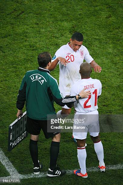Jermain Defoe of England replaces Alex Oxlade-Chamberlain of England during the UEFA EURO 2012 group D match between France and England at Donbass...